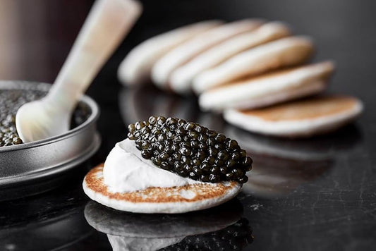 caviar on blini with cream